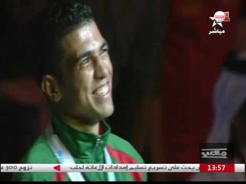 العواملة وربيعي يؤديان النشيد الوطني